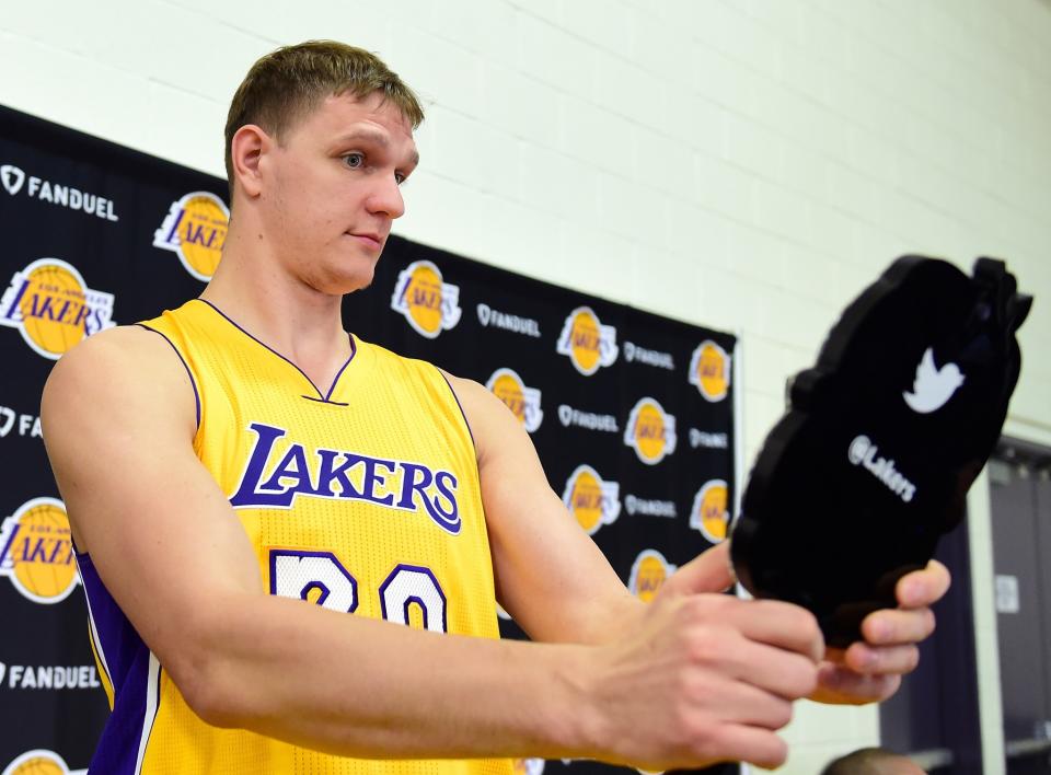 Timofey Mozgov makes sure his hair looks like $64 million. (Getty Images)