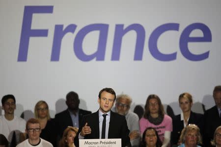 Emmanuel Macron, head of the political movement En Marche !, or Onwards !, and candidate for the 2017 presidential election, attends a campaign rally in Arras, France, April 26, 2017. REUTERS/Benoit Tessier