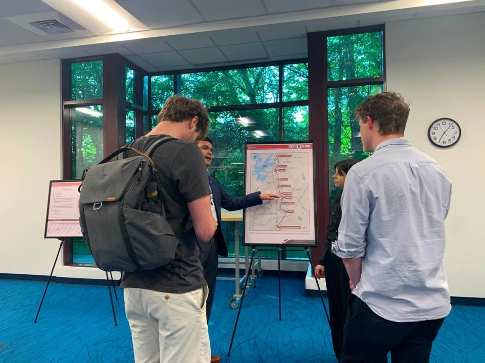 CATS staff explain what’s proposed for the Red Line to residents at a community meeting on the plan in Huntersville Thursday.