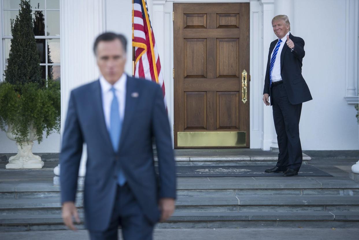 Mitt Romney, left, represents an old-fashioned GOP conservatism. Donald Trump, right, doesn't − and Romney is leaving politics. <a href="https://www.gettyimages.com/detail/news-photo/president-elect-donald-trump-gives-a-thumbs-up-as-mitt-news-photo/624809914?adppopup=true" rel="nofollow noopener" target="_blank" data-ylk="slk:Jabin Botsford/The Washington Post via Getty Images;elm:context_link;itc:0;sec:content-canvas" class="link ">Jabin Botsford/The Washington Post via Getty Images</a>