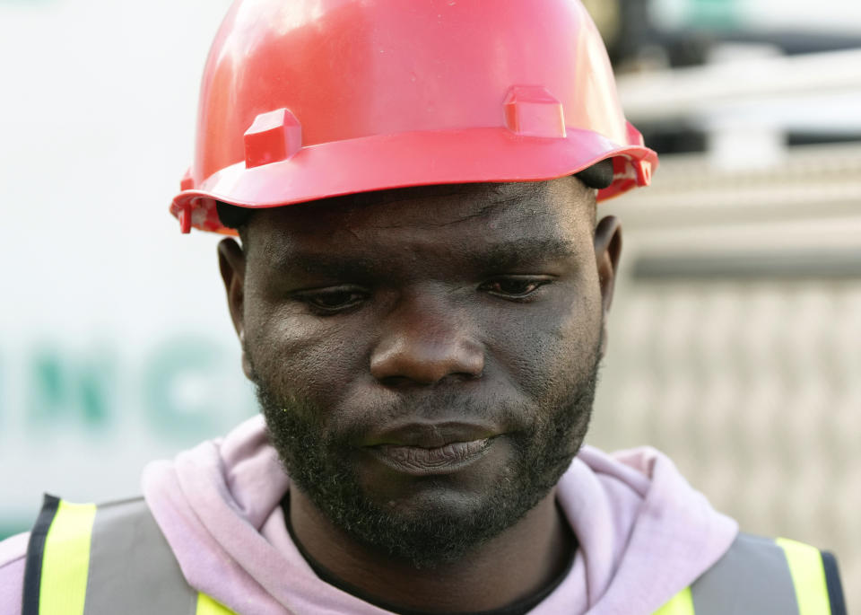 Construction worker, Joseph Malala, who survived the building collapse at the site of the ruins in George, South Africa, Wednesday, May 8, 2024. Rescue teams are into a third day searching for dozens of construction workers buried in the rubble of an unfinished five-story apartment building that collapsed in South Africa. (AP Photo/Nardus Engelbrecht)