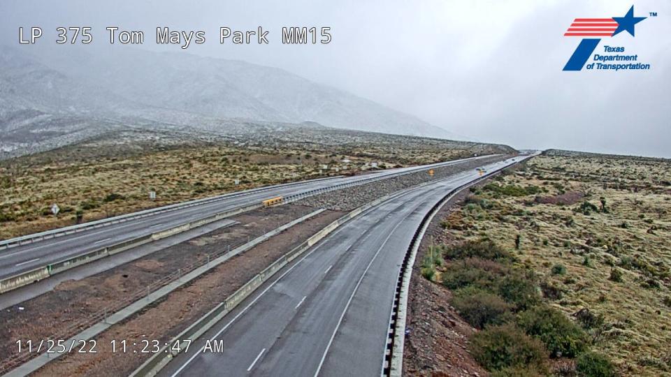 Snow accumulates along Trans Mountain Road near Tom Mays Park in this image from a Texas Department of Transportation traffic camera on Friday, Nov. 25, 2022.