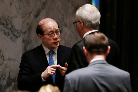 Russia's Ambassador to the United Nations Vitaly Churkin speaks with China's Permanent Representative to the United Nations Liu Jieyi inside the United Nations Security Council before a vote to adopt a resolution on the Comprehensive Nuclear-Test-Ban Treaty, at United Nations Headquarters in New York, U.S., September 23, 2016. REUTERS/Lucas Jackson