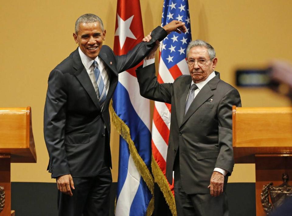 Back in March 2016, President Obama shakes hands with then-Cuban President Raul Castro, who lifts President Obama’s arm after delivering speeches at the Palacio de la Revolucion in Havana.