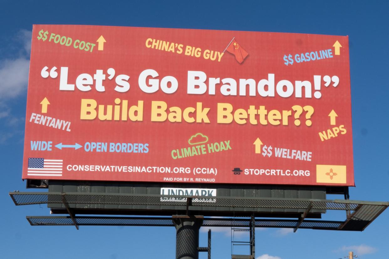 A billboard on a major road in Las Cruces reads “Let’s Go Brandon” — code for “F**k You Biden” — and includes other conservative memes. García and Reynaud used personal funds to pay for the billboard.