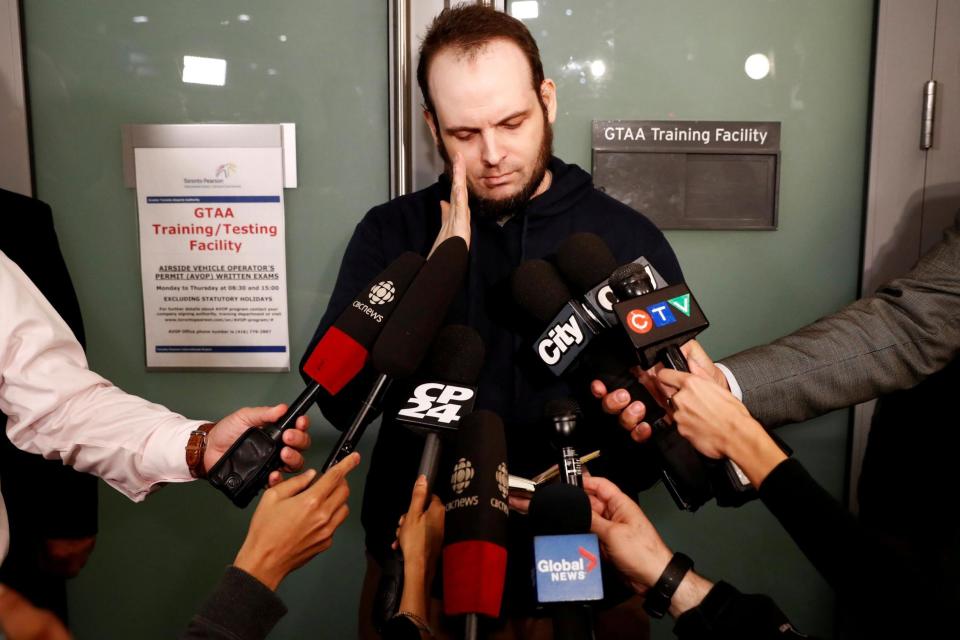 Joshua Boyle speaks to the media after arriving with his wife and three children to Toronto Pearson International Airport: REUTERS