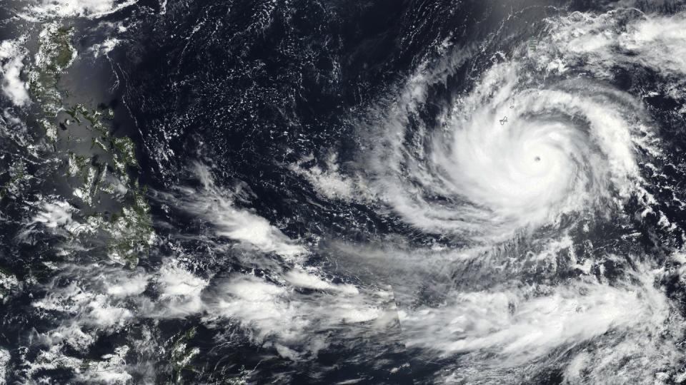 This May 23 satellite image from NASA shows Typhoon Mawar approaching Guam. (NASA via AP)