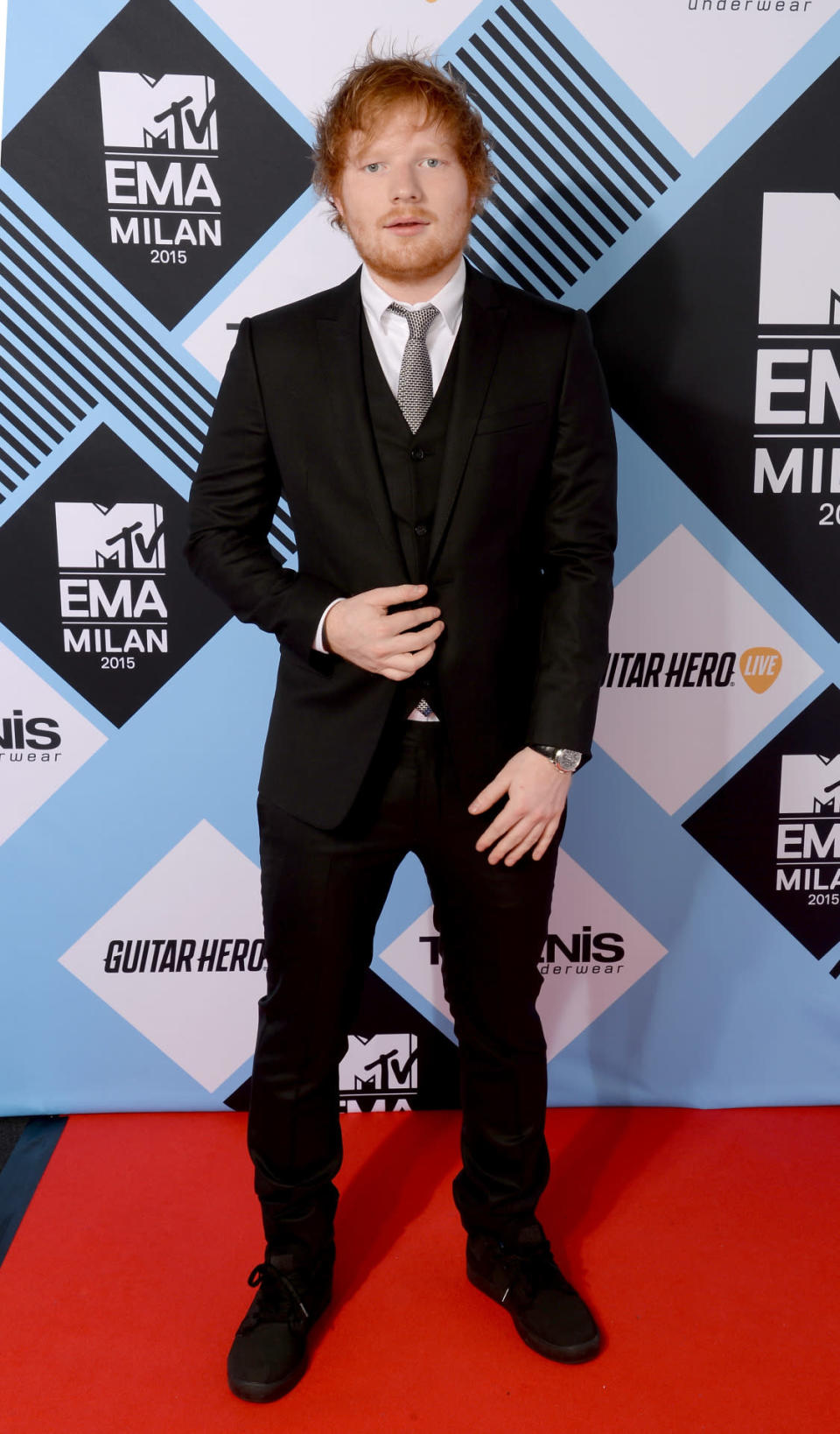 Ed Sheeran looks dapper in black Armani.