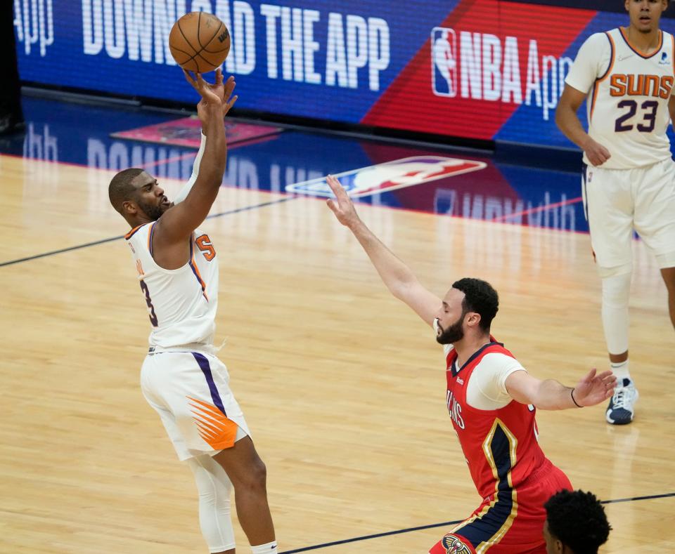 Apr 22, 2022; New Orleans, Louisiana, U.S.;  Phoenix Suns guard Chris Paul (3) shoots over New Orleans Pelicans guard Jose Alvarado (15) during Game 3 of the Western Conference playoffs. Mandatory Credit: Michael Chow-Arizona Republic
