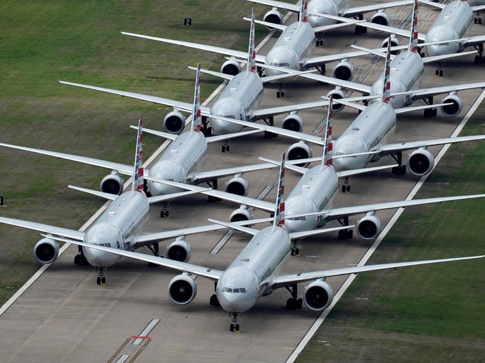 FILE PHOTO: American Airlines passenger planes crowd a runway where they are parked due to flight reductions made to slow the spread of coronavirus disease (COVID-19), at Tulsa International Airport in Tulsa, Oklahoma, U.S. March 23, 2020. REUTERS/Nick Oxford