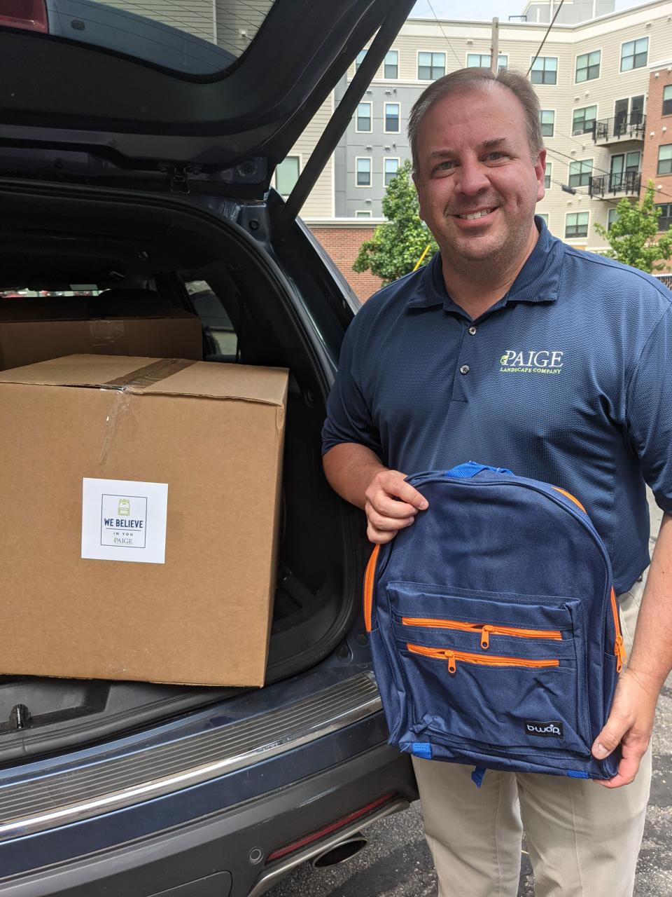 Brian Paige, of Paige Landscape Co., drops off more than 70 backpacks filled with supplies to Interfaith Social Services. Volunteers distributed more than 600 backpacks to the children of Interfaith’s food pantry clients in August.