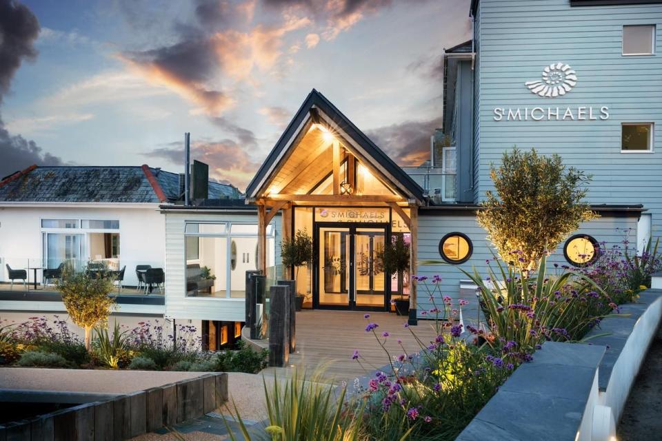 <p>Boasting refined beach-chic interiors and bags of coastal charm, <a href="https://www.booking.com/hotel/gb/stmichaels.en-gb.html?aid=2070936&label=family-holidays-cornwall" rel="nofollow noopener" target="_blank" data-ylk="slk:St Michaels Resort;elm:context_link;itc:0;sec:content-canvas" class="link ">St Michaels Resort</a> is a stylish and fun-packed Cornwall family holiday.</p><p>The calm waters of the south coast and the Blue Flag status of Gyllyngvase Beach make it a perfect swimming spot for kids. It boasts crystal-clear rock pools for inquisitive little ones, and water sports for those who enjoy a little adventure. Explore the secret beaches by paddleboard or take a kayak tour of Gylly Bay.<br><br>Parents will love the sleek spa, and children can also use the Health Club’s swimming pool facilities (children’s swim times apply) and the hotel’s Brasserie on the Bay restaurant offers a children’s menu in a relaxed and informal setting with gorgeous views out to sea.</p><p>There's a range of family-friendly accommodation, including dedicated family rooms, a family suite and large rooms with sofa beds. So what are you waiting for? Get browsing...</p><p><a href="https://www.primaholidays.co.uk/offers/cornwall-falmouth-st-michaels-resort-hotel" rel="nofollow noopener" target="_blank" data-ylk="slk:Read our review of St Michaels Resort;elm:context_link;itc:0;sec:content-canvas" class="link ">Read our review of St Michaels Resort</a></p><p><a class="link " href="https://www.booking.com/hotel/gb/stmichaels.en-gb.html?aid=2070936&label=family-holidays-cornwall" rel="nofollow noopener" target="_blank" data-ylk="slk:CHECK AVAILABILITY;elm:context_link;itc:0;sec:content-canvas">CHECK AVAILABILITY</a></p>