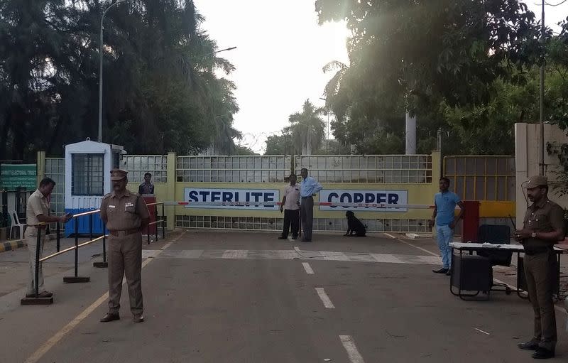 Police stand gurad outside a copper smelter controlled by London-listed Vedanta Resources in Thoothukudi