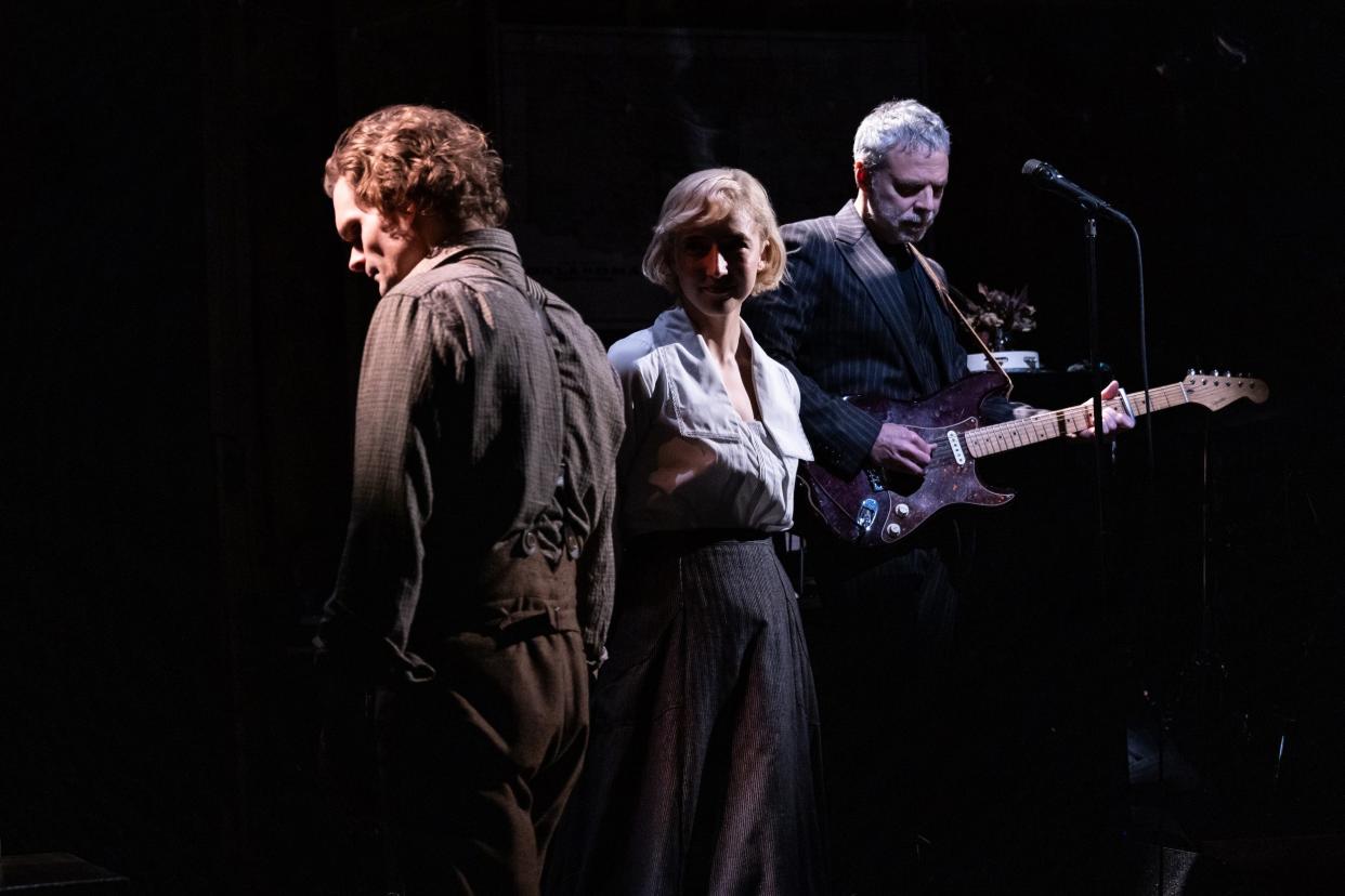 From left, Andrew Durand, Julia Knitel, and Erik Della Penna appear in the Off-Broadway world-premiere musical "Dead Outlaw," based on the true story of a early 20th-century outlaw-turned-mummy who robbed, died and eventually was buried in Oklahoma.