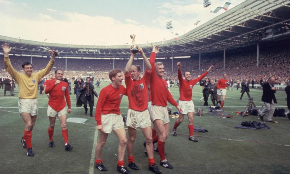 <span>Bobby Charlton lifts the Jules Rimet trophy at Wembley after England’s triumph in 1966.</span><span>Photograph: Hulton Archive/Getty Images</span>