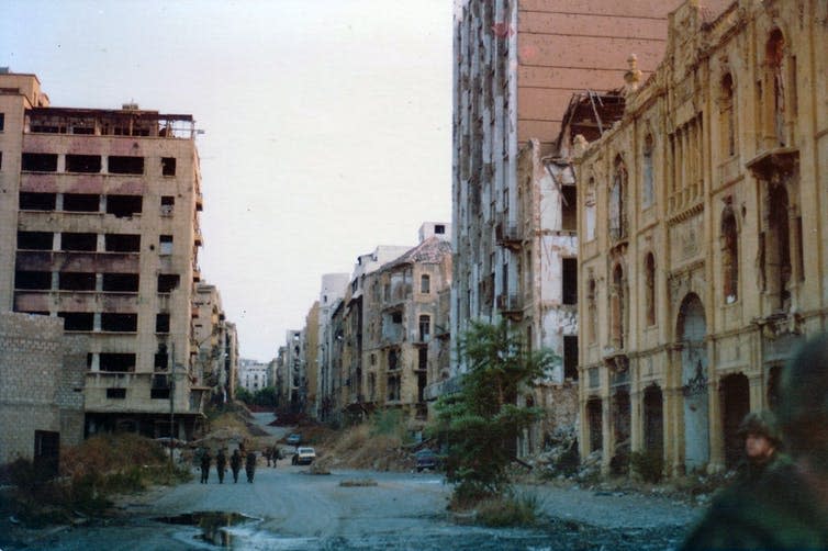 <span class="caption">The Green Line in Beirut during the Civil War.</span> <span class="attribution"><a class="link " href="https://commons.wikimedia.org/wiki/File:Green_Line,_Beirut_1982.jpg" rel="nofollow noopener" target="_blank" data-ylk="slk:James Case/ CC BY;elm:context_link;itc:0;sec:content-canvas">James Case/ CC BY</a>, <a class="link " href="http://creativecommons.org/licenses/by/4.0/" rel="nofollow noopener" target="_blank" data-ylk="slk:CC BY;elm:context_link;itc:0;sec:content-canvas">CC BY</a></span>