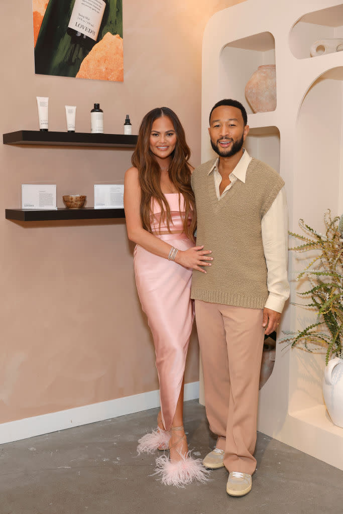 LOS ANGELES, CALIFORNIA - JULY 20: (L-R) Chrissy Teigen and John Legend attend LOVED01 By John Legend Launches Pop-Up At at Westfield Century City on July 20, 2023 in Los Angeles, California. (Photo by Stefanie Keenan/Getty Images for LOVED01)