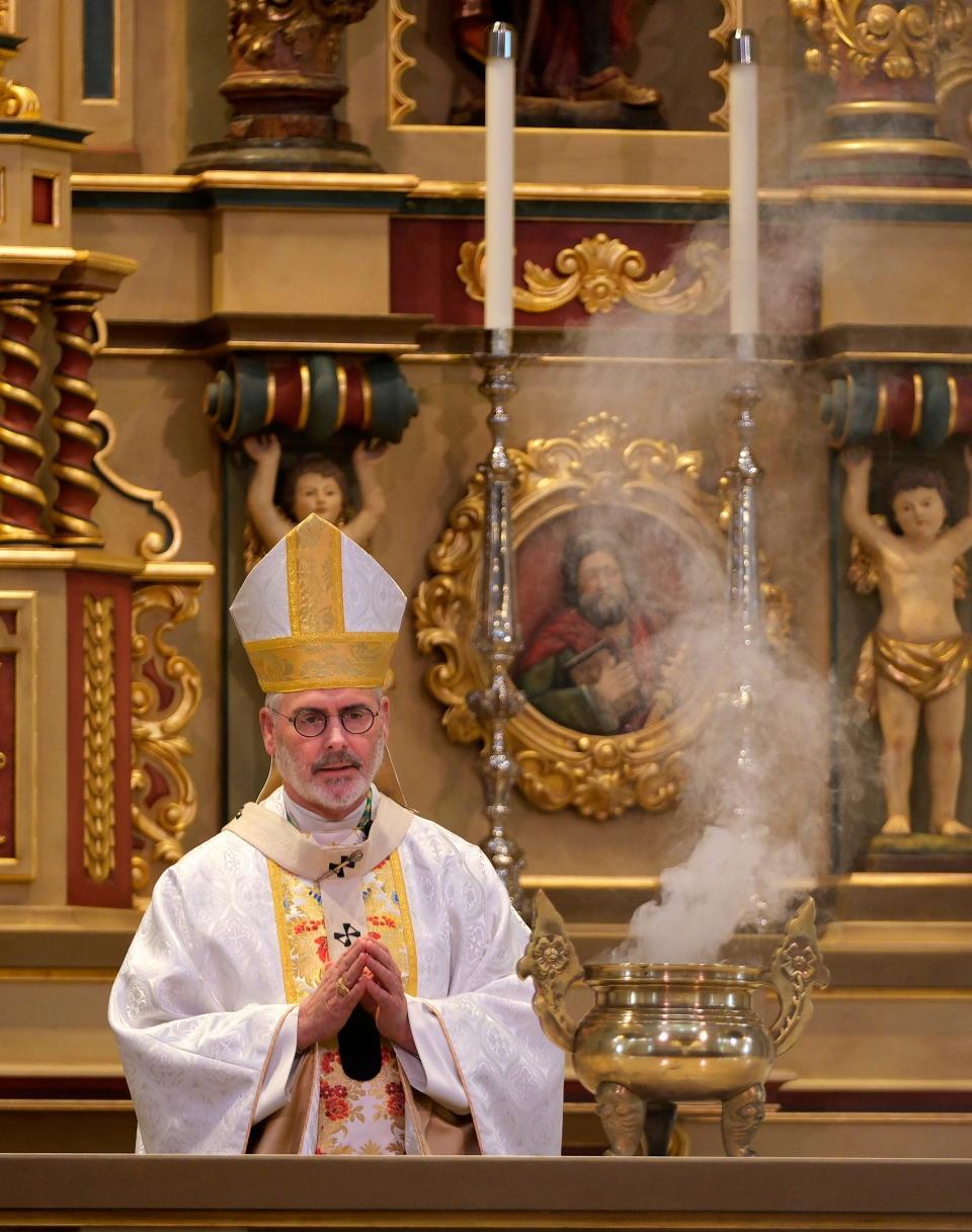 Archbishop Pul S. Coakley and The Incensation of the Altar and the Church at the Mass for the Dedication of a Church and Altar at the Blessed Stanley Rother Shrine Friday, February 17, 2023