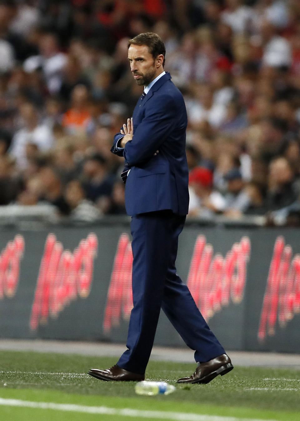 <p>England’s manager Gareth Southgate walks along his coaching zone during the World Cup Group F qualifying soccer match between England and Slovakia at Wembley Stadium in London, England, Monday, Sept. 4, 2017. (AP Photo/Kirsty Wigglesworth) </p>