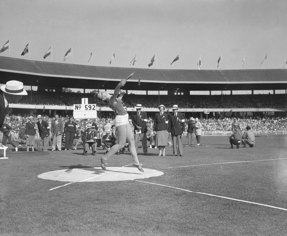 Olga Fikotova competes for Czechosolovakia in discus at the 1956 Melbourne Olympic Games.