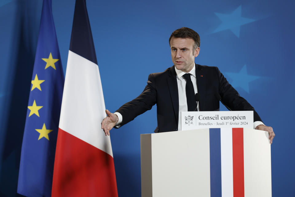 French President Emmanuel Macron talks to journalists in a news conference during an EU summit in Brussels, Thursday, Feb. 1, 2024. The leaders of the 27 European Union countries sealed a deal on Thursday to provide Ukraine with a new 50 billion-euro ($54 billion) support package for its war-ravaged economy after Hungary backed down from its threats to veto the move. (AP Photo/Omar Havana)