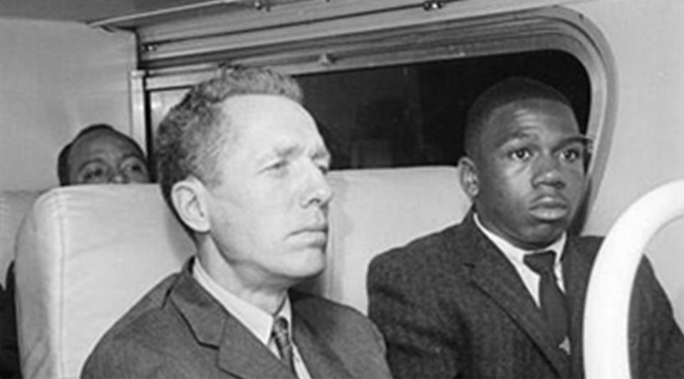 Freedom Riders Charles Person, right, and James Peck on the bus in 1961, with James Farmer, the head of CORE, in the background.