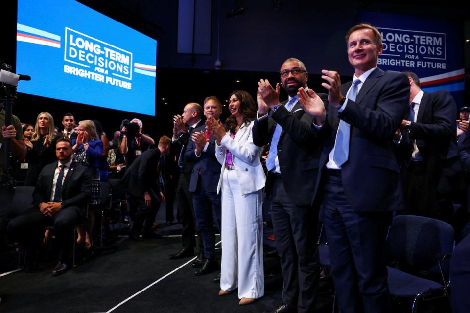 Senior Conservative cabinet ministers react during the Conservative Party's annual conference (REUTERS)