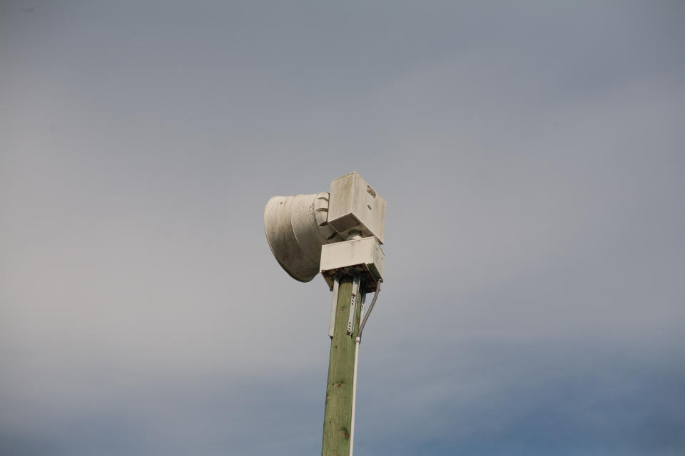 close up of a tornado siren