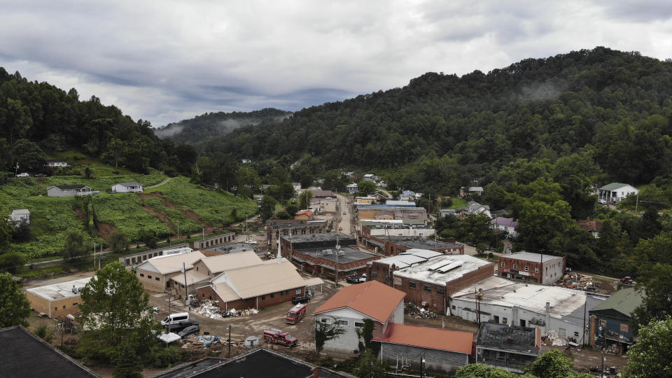 Thunderstorm clouds roll in over the hills of Fleming-Neon, Ky., on Friday, Aug. 5, 2022. The small town was evacuated after rain began due to massive flooding the previous week. (AP Photo/Allen G. Breed)