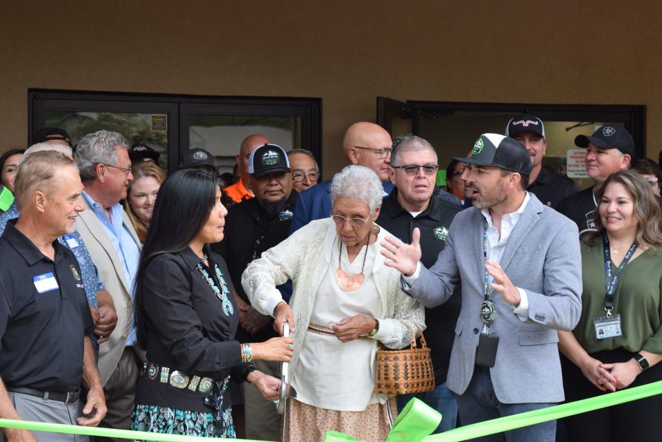 Myrtle Driver prepares to cut the ribbon during the Eastern Band of Cherokee Great Smoky Cannabis Co. grand opening. April 20, 2024.