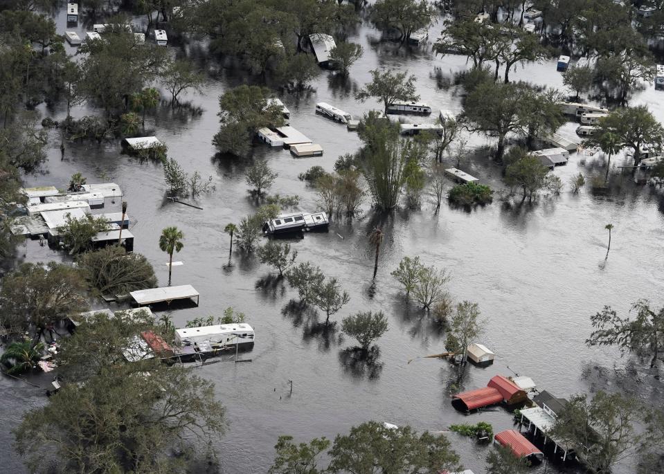 An RV park is inundated with floodwaters after Hurricane Ian, Thursday, Sept. 29, 2022, in Arcadia, Fla.