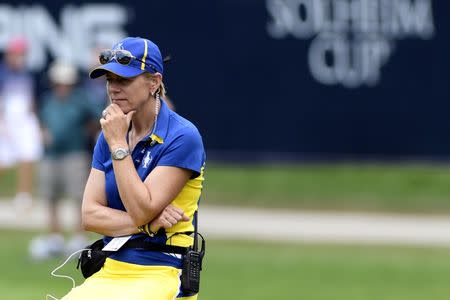 Aug 20, 2017; West Des Moines, IA, USA; Europe captain Annika Sorenstam looks on at the 16th green in the final round of The Solheim Cup international golf tournament at Des Moines Golf and Country Club. Mandatory Credit: Thomas J. Russo-USA TODAY Sports