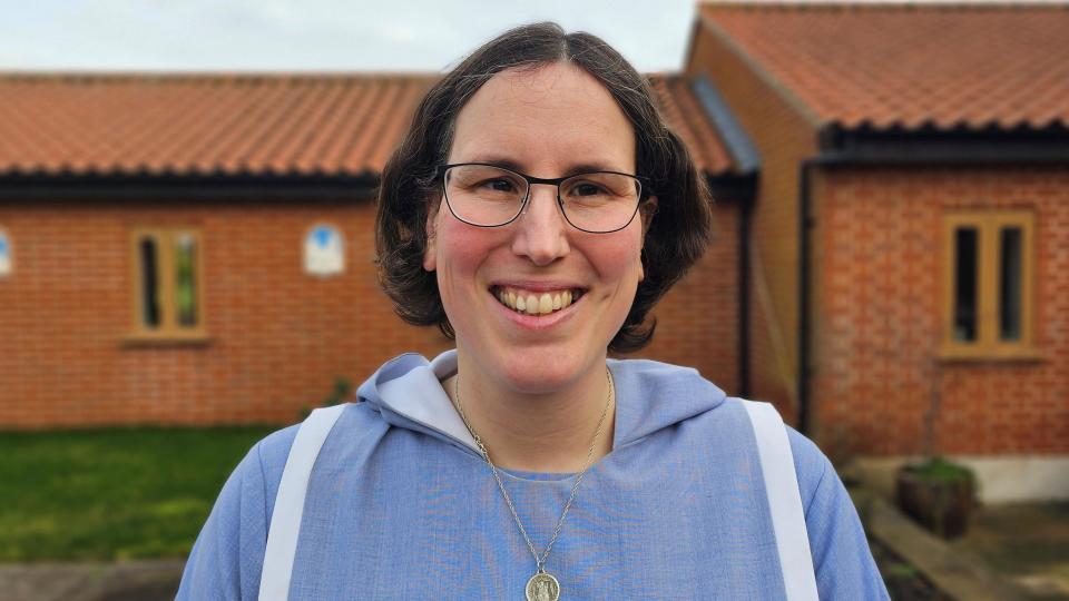 Sister Theresa, smiling in the grounds of the convent