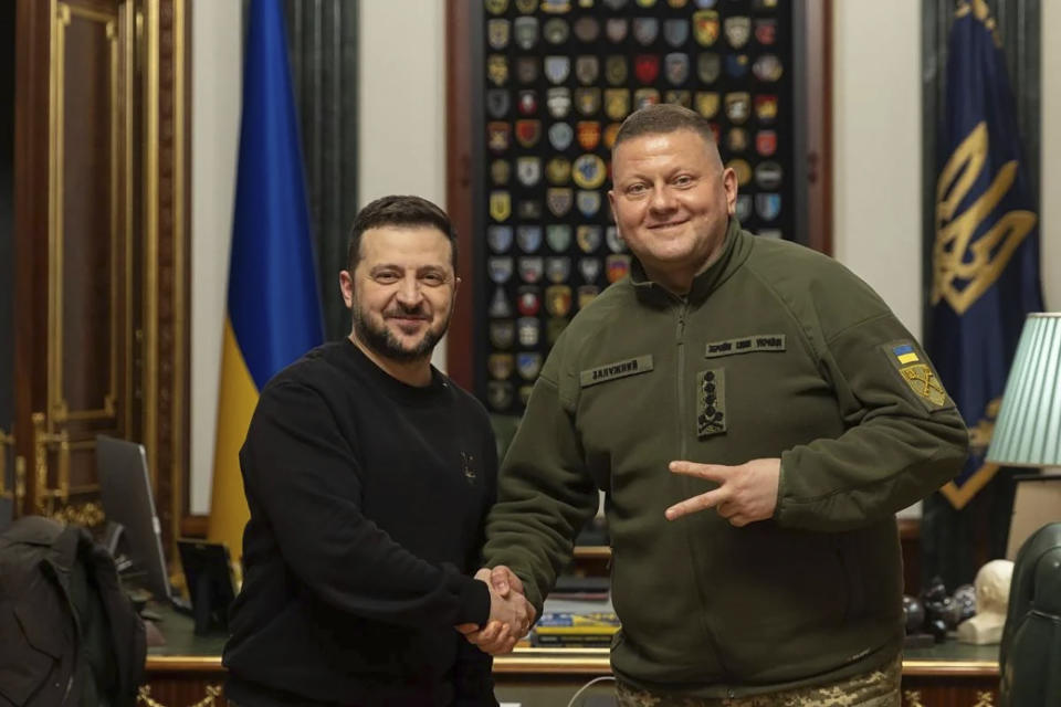 In this photo provided by the Ukrainian Presidential Press Office, Ukrainian President Volodymyr Zelenskyy, left, shake hand with Commander-in-Chief of Ukraine's Armed Forces Valerii Zaluzhnyi during their meeting in Kyiv, Ukraine, Thursday, Feb. 8, 2024. Ukrainian President Volodymyr Zelenskyy has met with Ukraine’s top general and told him it’s time for someone new to lead the army. (Ukrainian Presidential Press Office via AP)