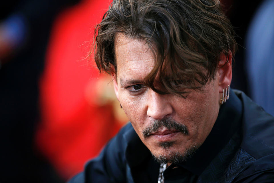 <p>Actor Johnny Depp arrives on the red carpet for the global premiere of the film “Pirates of the Caribbean: Dead Men Tell No Tales”, in Shanghai, China May 11, 2017. (Photo: Aly Song/Reuters) </p>