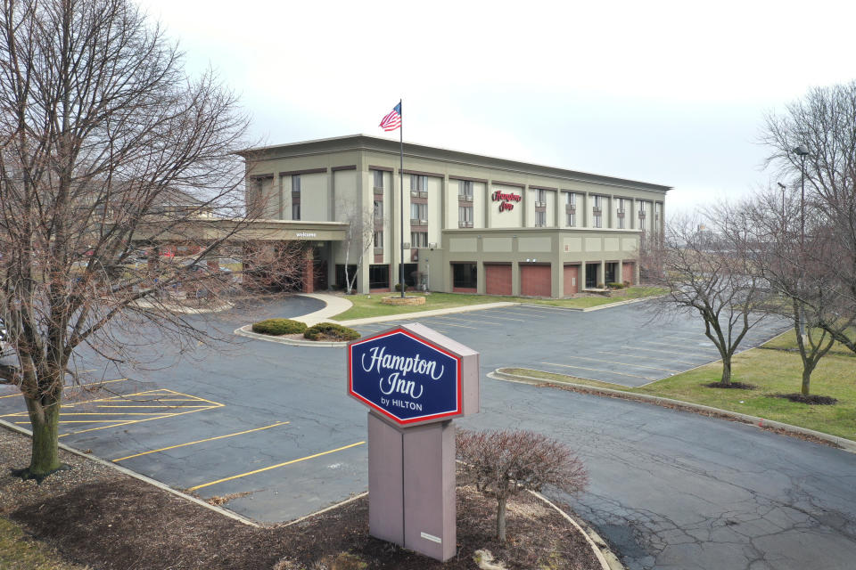 ROCKFORD, ILLINOIS  - MARCH 24: The parking lot is nearly at a Hampton Inn hotel on March 24, 2020 in Rockford, Illinois.  (Photo by Scott Olson/Getty Images)