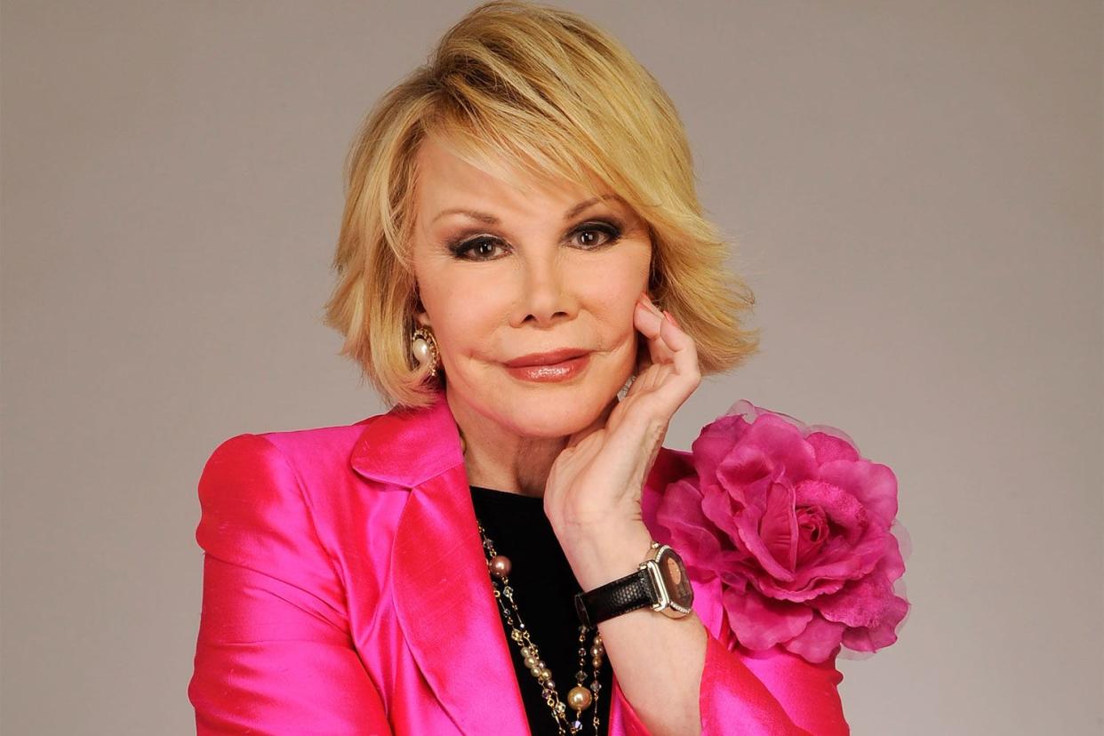 <p>Larry Busacca/Getty</p> Joan Rivers in 2010