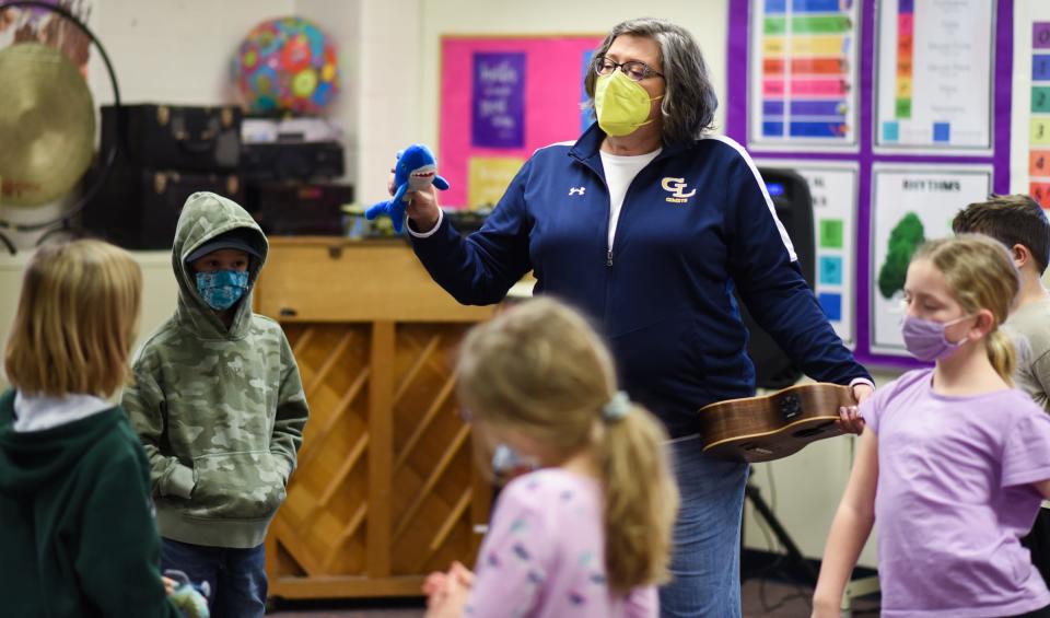 Wacousta Elementary School teacher Cathy Fox works with second-grade students as they practice singing in pitch Monday Feb. 7, 2022.