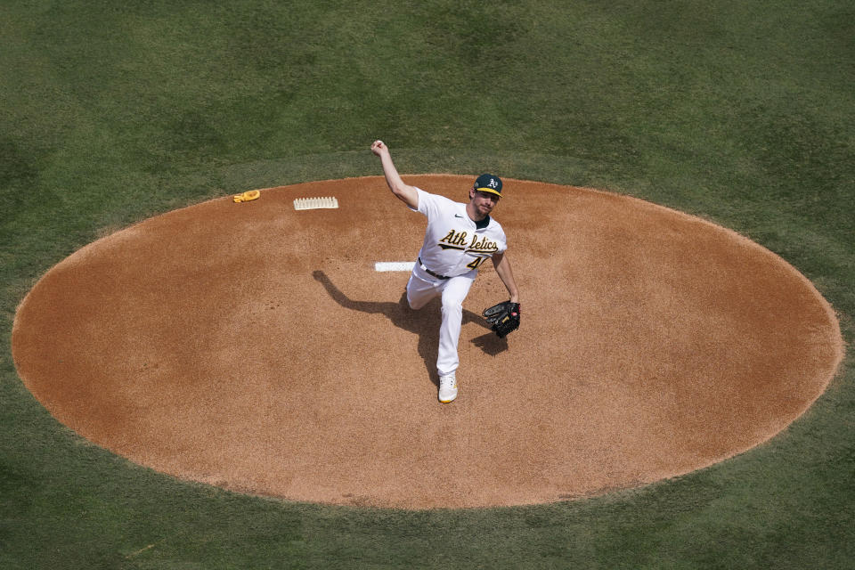 Oakland Athletics' Chris Bassitt pitches against the Houston Astros during the first inning of Game 1 of a baseball American League Division Series in Los Angeles, Monday, Oct. 5, 2020. (AP Photo/Ashley Landis)