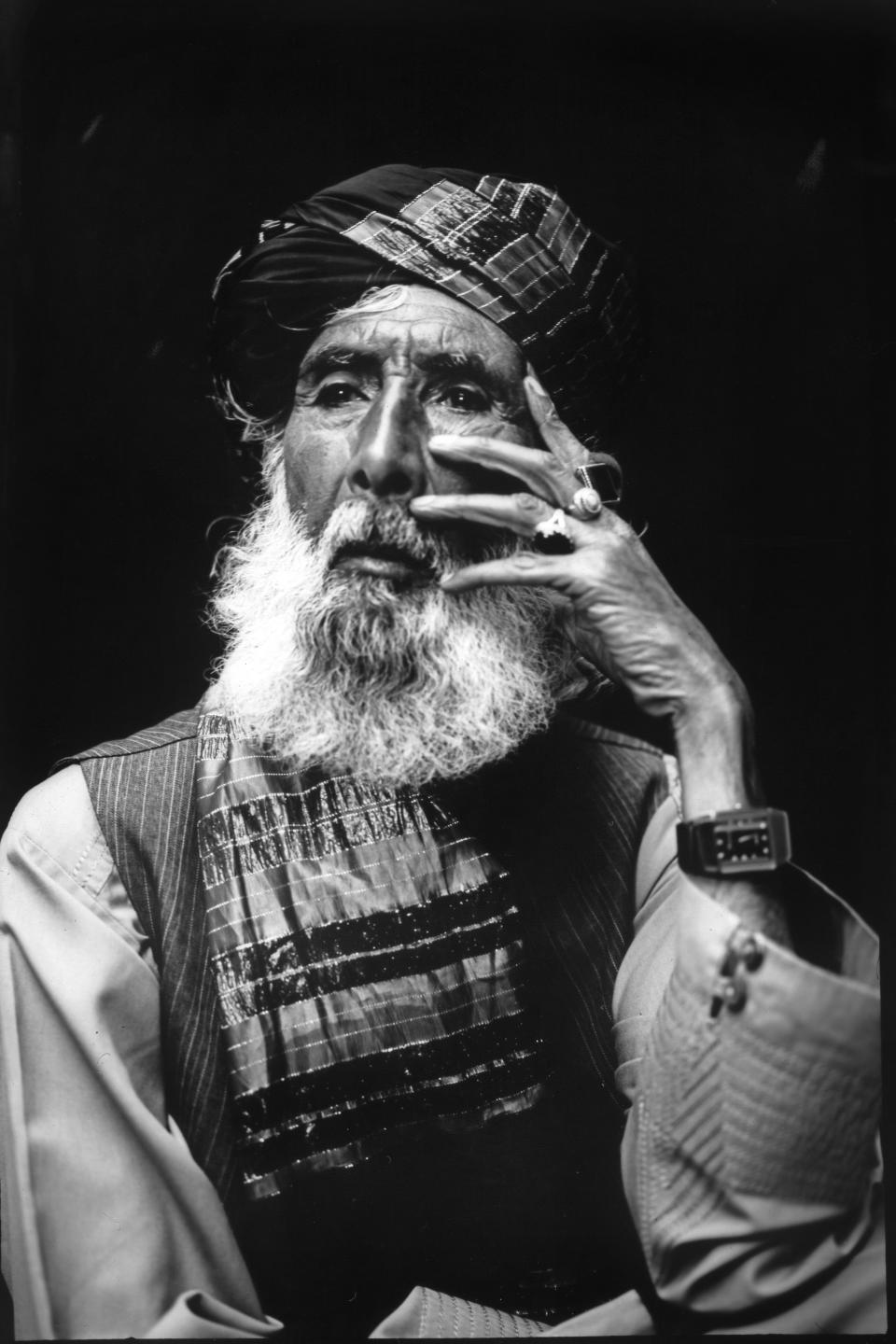 Actor Nabi Attai, 74, poses for a portrait in Kabul, Afghanistan, Wednesday, June 7, 2023. Nabi has appeared in more than 76 films and 12 series. When the Taliban banned movies, Attai had nothing to fall back on. In his 70s, the actor appeared in a dozen television series and 76 films, including the Golden Globe-winning 2003 movie “Osama.” Now he is destitute. (AP Photo/Rodrigo Abd)