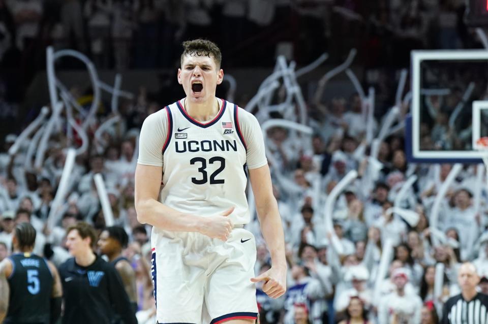Feb 24, 2024; Storrs, Connecticut, USA; UConn Huskies center Donovan Clingan (32) reacts after timeout is called as they take on the Villanova Wildcats in the second half at Harry A. Gampel Pavilion. Mandatory Credit: David Butler II-USA TODAY Sports