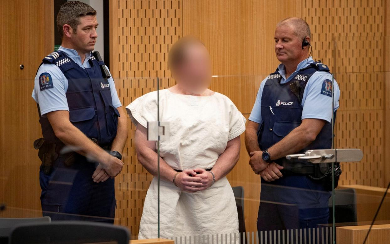 Brenton Tarrant, pictured here in the dock at Christchurch District Court, will now face 92 charges following the March mosque shooting - REUTERS