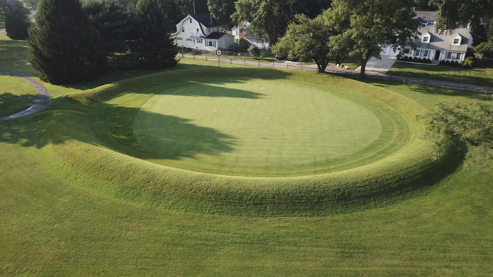 FILE - A 155-foot diameter circular enclosure around hole number 3 at Moundbuilders Country Club at the Octagon Earthworks in Newark, Ohio, is pictured July 30, 2019. A trial was slated to begin Tuesday, May 28, 2024, to determine how much the historical society must pay for the ancient ceremonial and burial earthworks, which is among eight ancient areas in the Hopewell Earthworks system named a World Heritage Site last year. (Doral Chenoweth III/The Columbus Dispatch via AP, File)