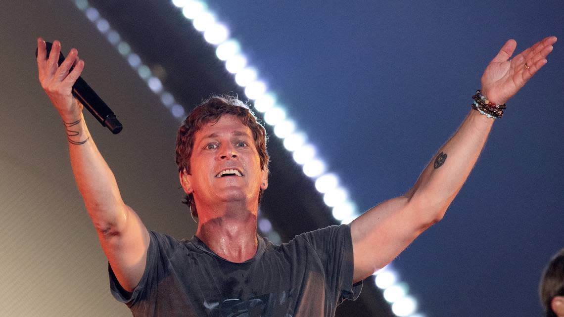 Rob Thomas embraces the crowd as Matchbox 20 brings their “Slow Dream Tour” to Raleigh, N.C.’s Coastal Credit Union Music Park at Walnut Creek, Wednesday night, July 12, 2023.