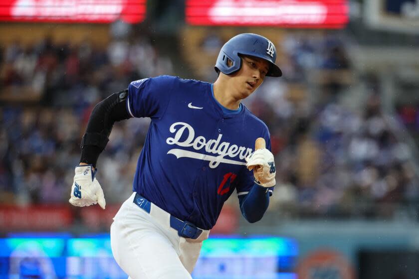 Los Angeles, CA - March 24: Los Angeles Dodgers designated hitter Shohei Ohtani (17) runs the bases.