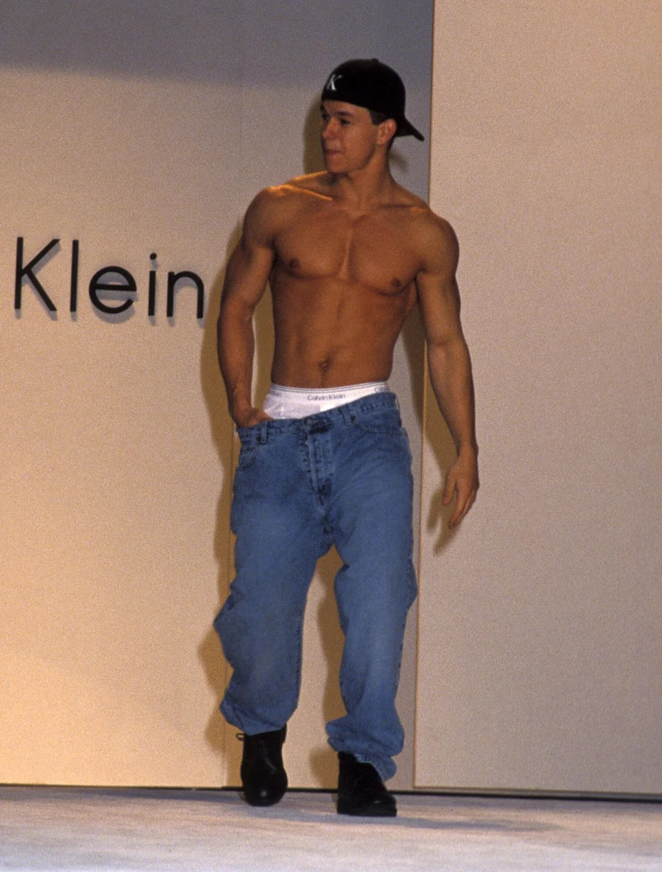 Singer Mark Wahlberg walks the runway at the Seventh Annual California Fashion Industry Friends of AIDS Project Los Angeles (APLA) Benefit Dinner and Fashion Show to Honor Calvin Klein on June 3, 1993 at the Hollywood Bowl in Hollywood, California.