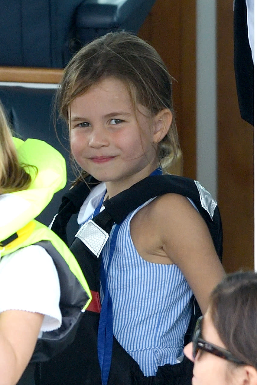 Princess Charlotte joined her big brother on the boat, wearing a <a href="https://uk.style.yahoo.com/princess-charlotte-dress-ralph-lauren-where-to-buy-090650073.html" data-ylk="slk:striped Ralph Lauren dress;elm:context_link;itc:0;sec:content-canvas;outcm:mb_qualified_link;_E:mb_qualified_link;ct:story;" class="link  yahoo-link">striped Ralph Lauren dress</a>. <em>[Photo: Getty]</em>