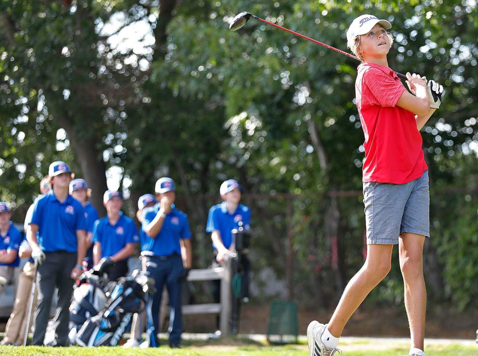 Norths #1 John Tolan a junior drives off the first tee.The annual Quincy vs. North Quincy high golf match teed off at the Furnace Brook Golf Course on Wednesday September 14, 2022.