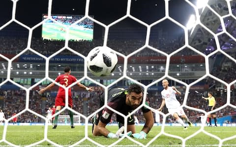 Diego Costa (out of frame) of Spain scores the equalising goal to make the score 1-1 during the 2018 FIFA World Cup Russia group B match between Portugal and Spain at Fisht Stadium on June 15, 2018 in Sochi - Credit: Maddie Meyer/REMOTE/Getty Images