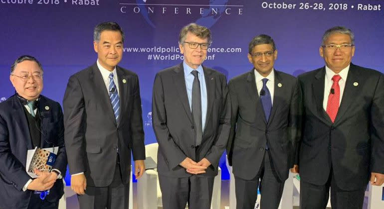 陳啟宗（左一）、梁振英（左二）去年一同出席世界政策論壇。一帶一路國際合作中心圖片